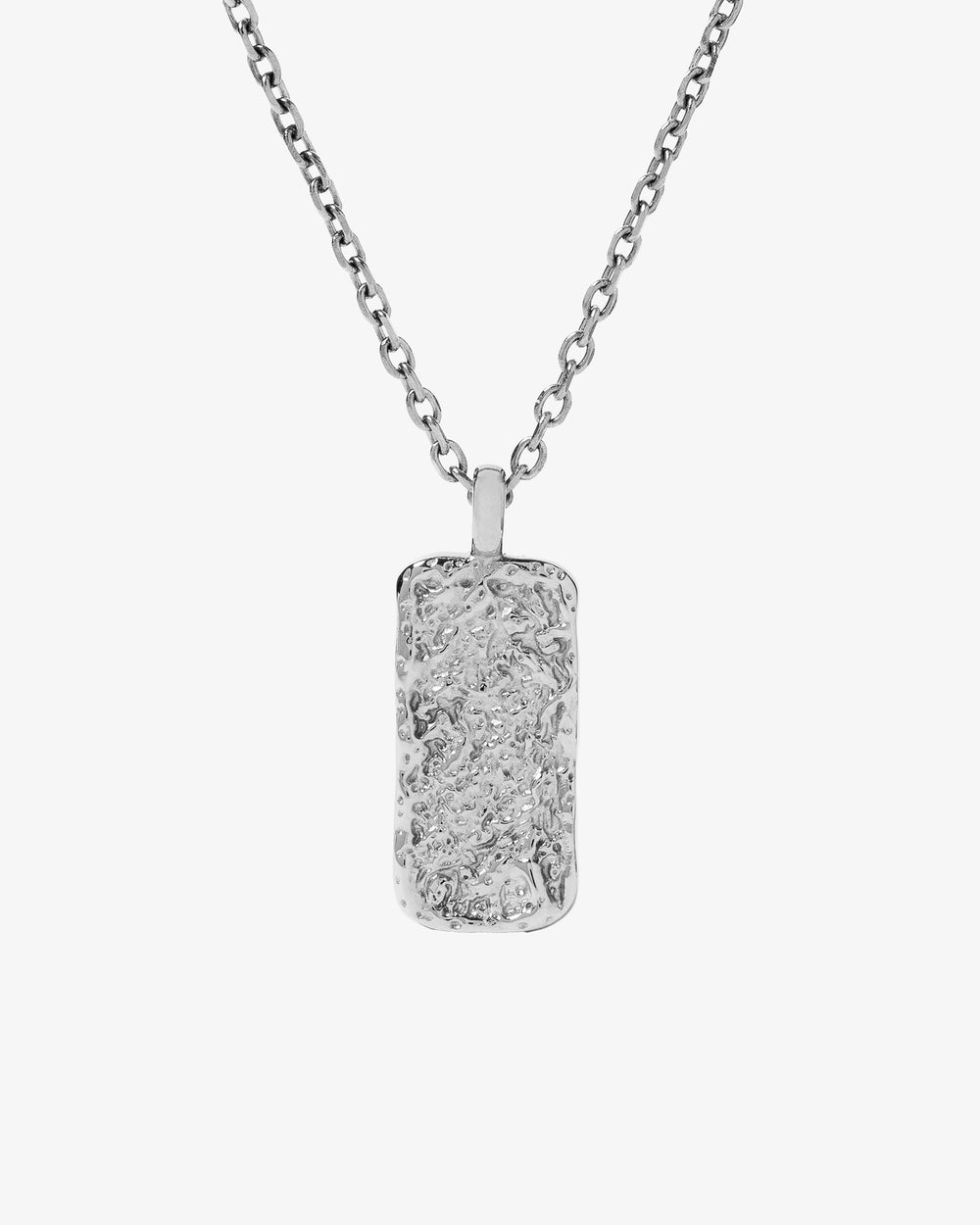 Moonrock silver necklace with a hammered rectangular pendant on a silver chain against a white background