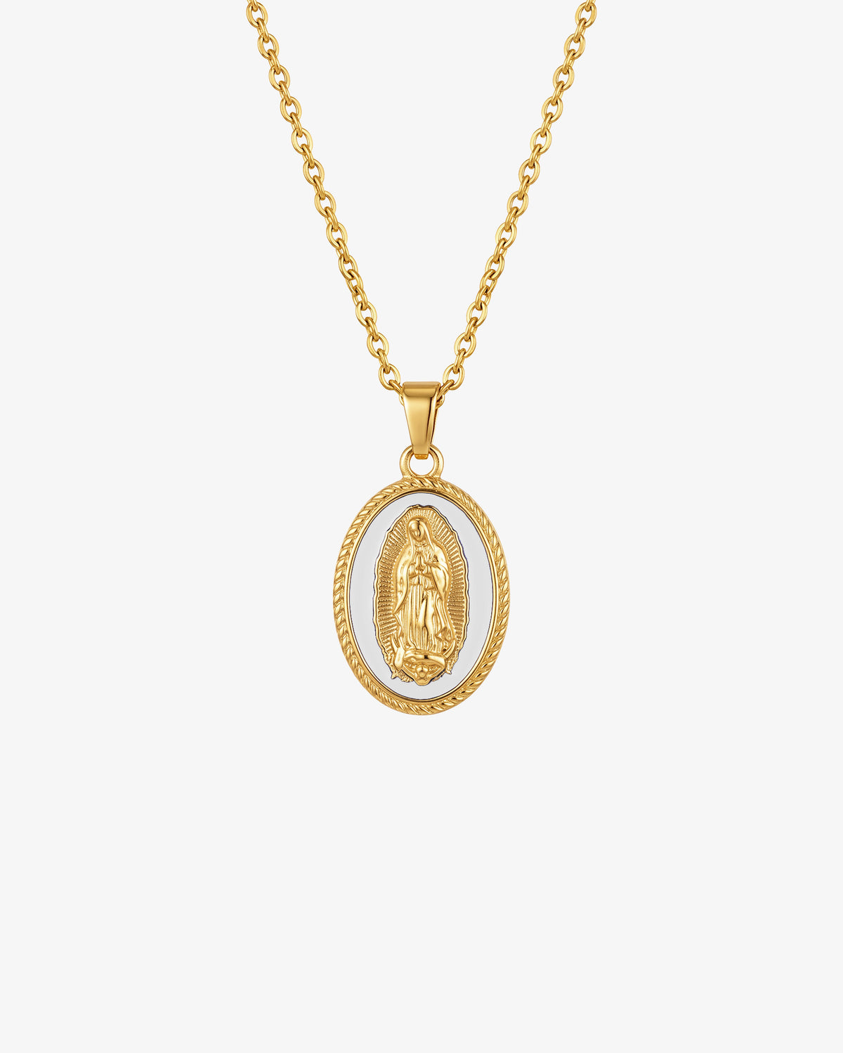 Gold chain necklace with an oval Virgin Mary pendant on white enamel background.